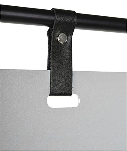 Minimalist sign stand with modern black leather straps