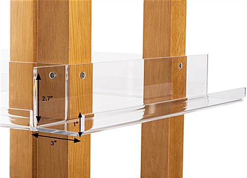 Revolving wood literature rack with three sixteenths inch thick acrylic shelves 