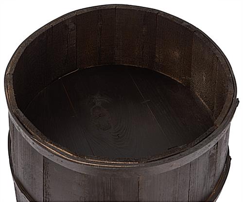 Bourbon barrel display case has a 8 inch deep false bottom