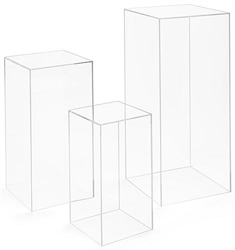 Clear nested display pedestal set with floor standing placement 