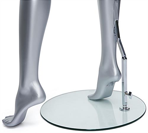 Standing female full-body mannequin with stabilizing calf rod