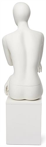 Abstract seated female mannequin measures 52 inches tall 