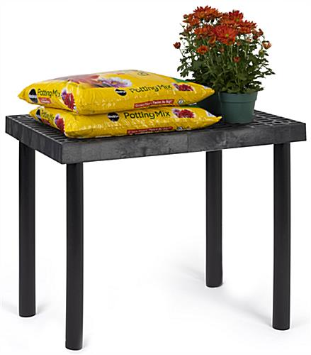 Durable plastic display bench with weather resistant construction 