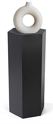 Hexagon retail pedestal with scratch resistant base