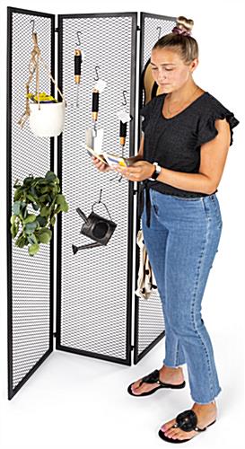 Hinged mesh retail display screen with overall dimensions of 45 inches wide by 72 inches tall