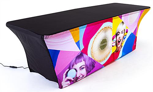 Black stretch top and back on 8' event table package with custom spandex cover and LED light kit