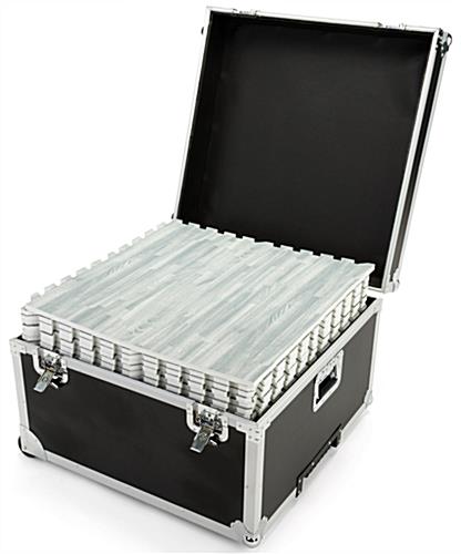 Trade show floor tile carrying case shown holding interlocking pieces