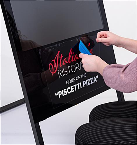 Simple to apply removable no adhesive vinyl sign