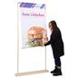 Rolling Up the Banner on a Wooden Banner Stand