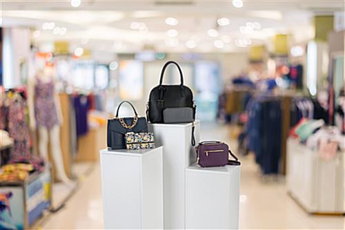 White Laminate Pedestal in a Retail Store