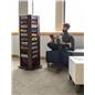 Oak magazine rack red mahogany finish in lobby area