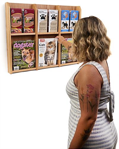 Hanging magazine rack with adjustable pockets is great for sharing materials 